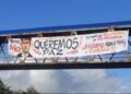 Bandeira com mensagem “Queremos paz” é instalada na Avenida Paralela, em Salvador